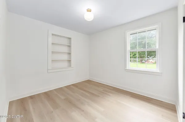 an empty room with a window