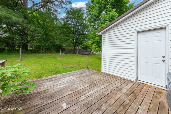 a view of a backyard with a garden