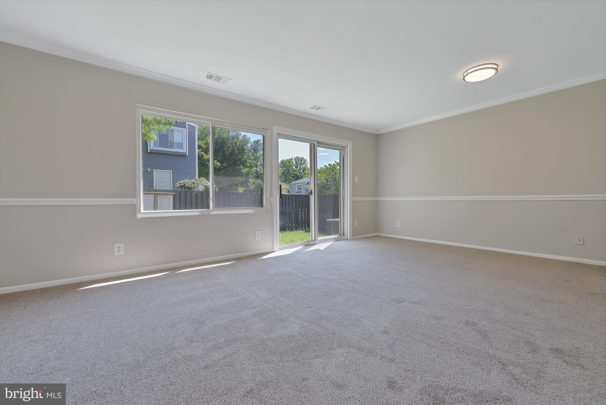 17472 Hoskinson Road Poolesville, MD 20837 - Photo 19 of 42 Walk-out area in living room to backyard!
