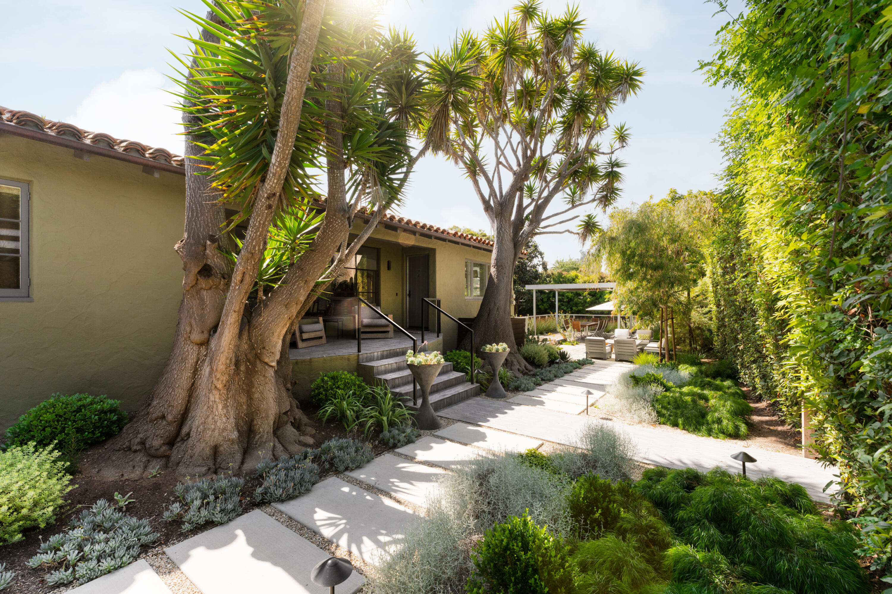 1365 Virginia Road Montecito, CA 93108 - Photo 1 of 38 a front view of a house with garden
