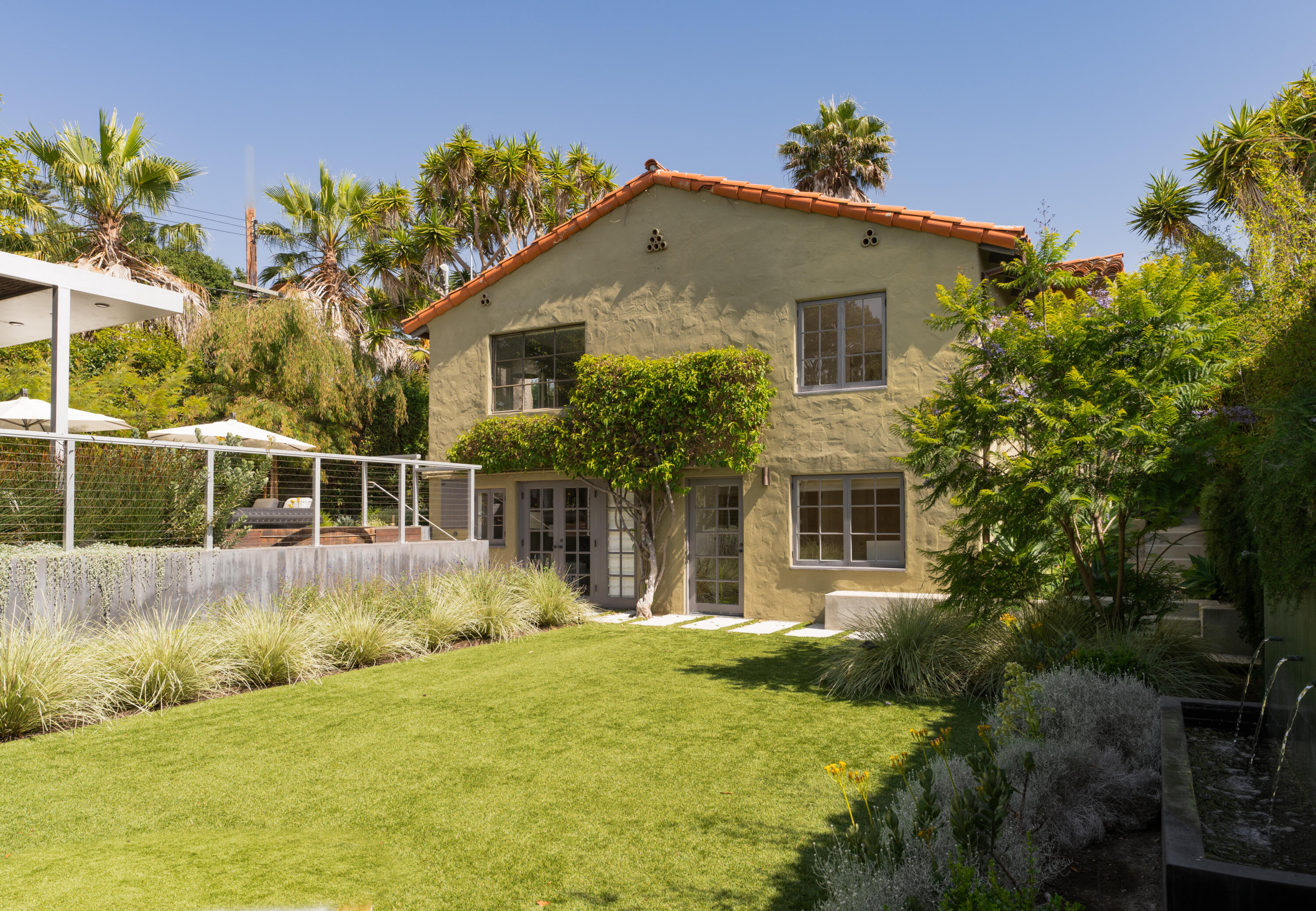 1365 Virginia Road Montecito, CA 93108 - Photo 2 of 38 a front view of a house with a garden