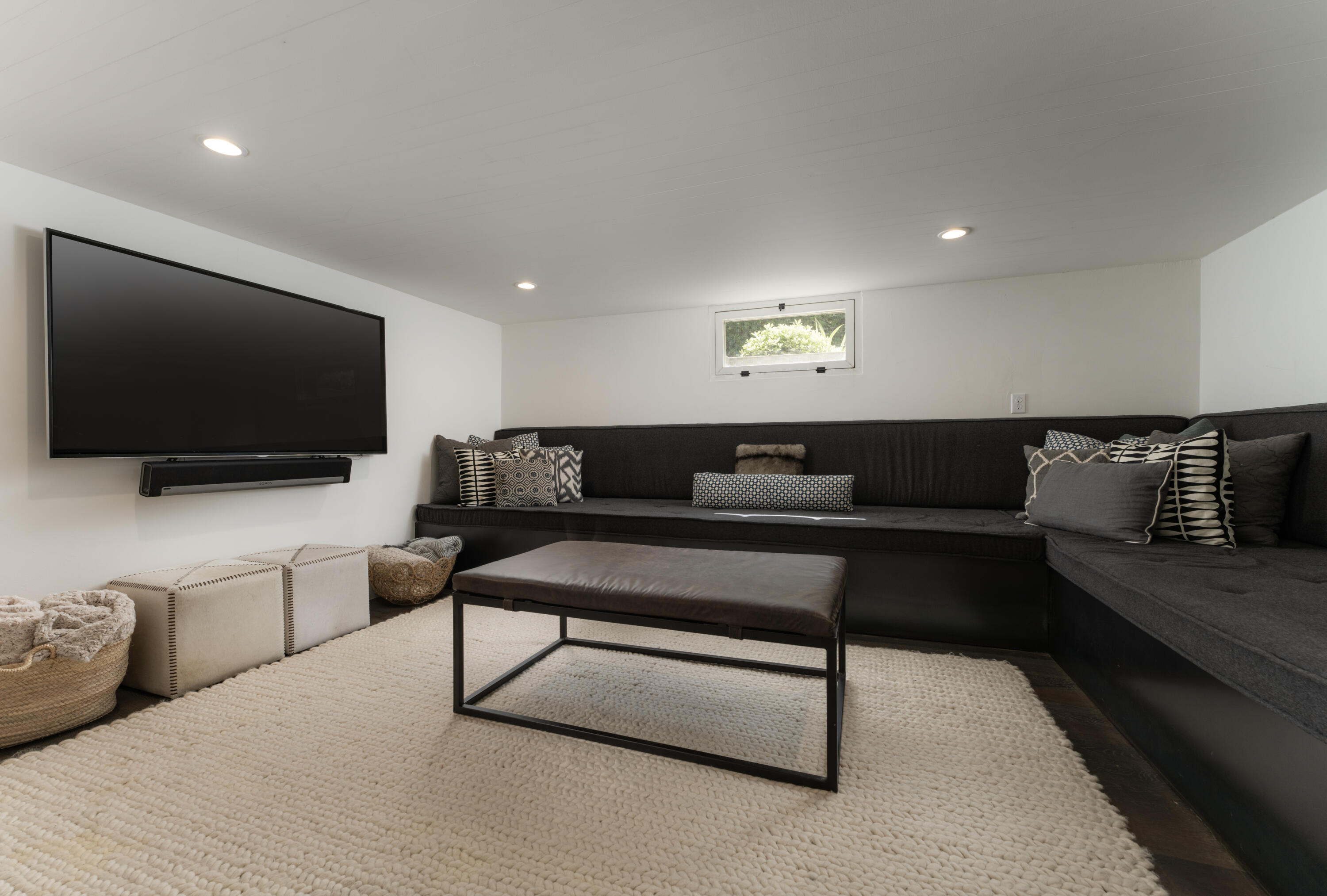 1365 Virginia Road Montecito, CA 93108 - Photo 22 of 38 a living room with furniture and a flat screen tv