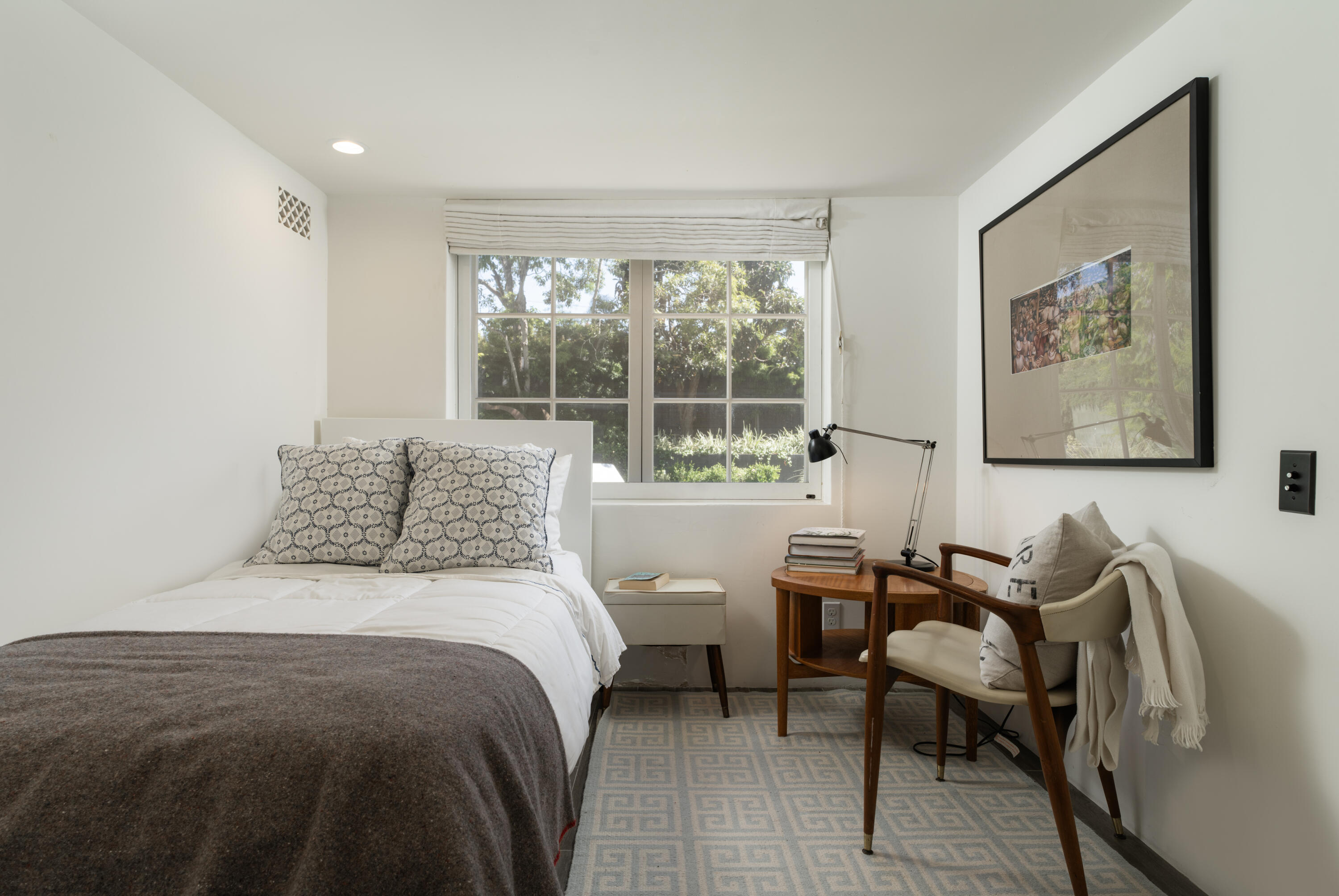 1365 Virginia Road Montecito, CA 93108 - Photo 24 of 38 a bedroom with a bed and wooden floor