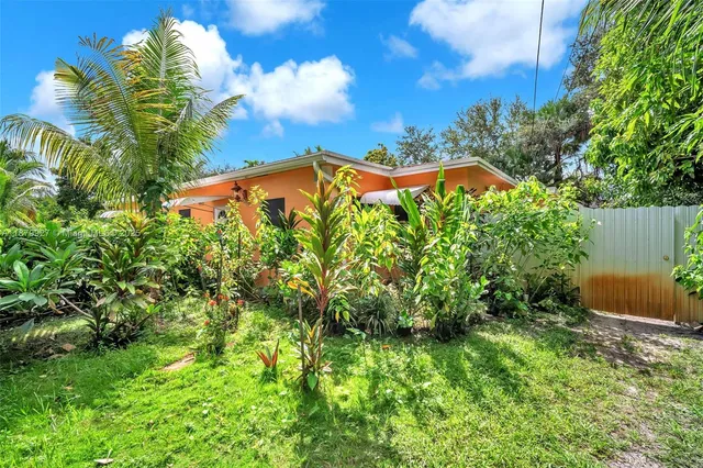 a view of a yard with an outdoor space