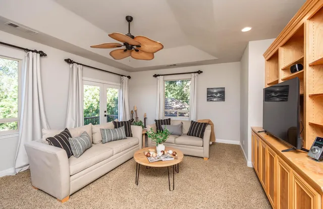 a bedroom with bed and window