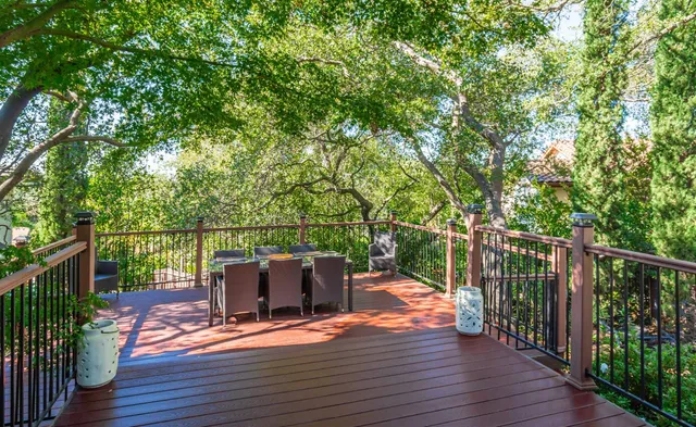 a view of a pathway with a yard