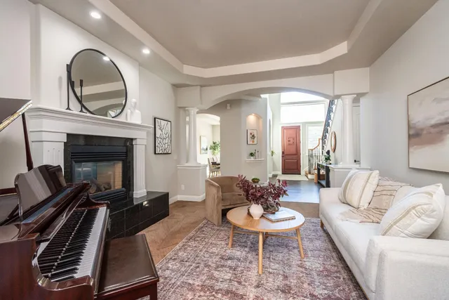a kitchen with stainless steel appliances granite countertop a stove and a refrigerator