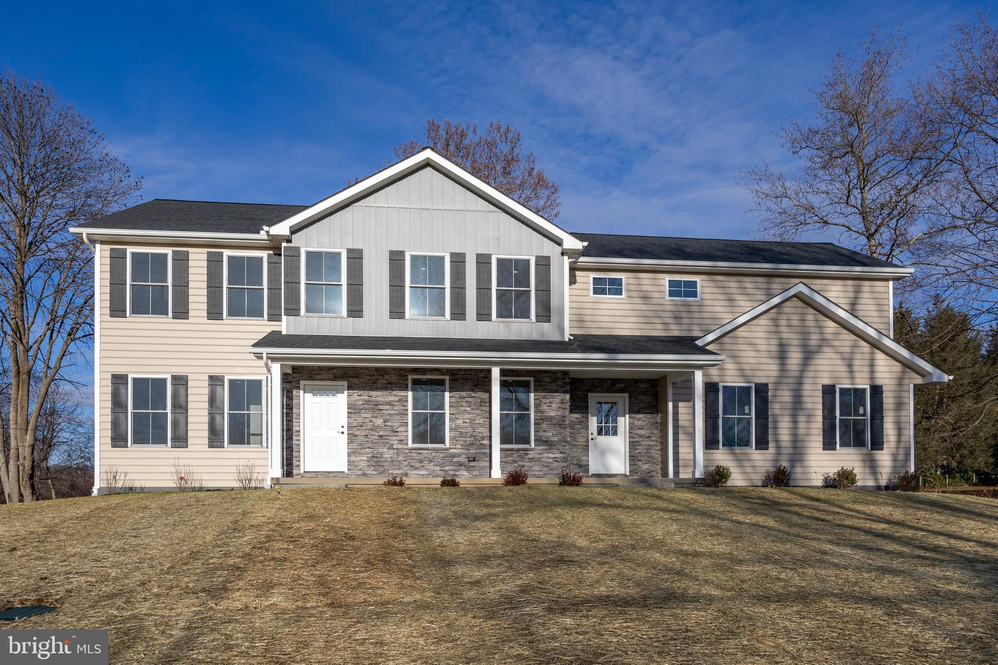 660 Little Conestoga Road Downingtown, PA 19335 - Photo 1 of 56 front view of a house with a yard