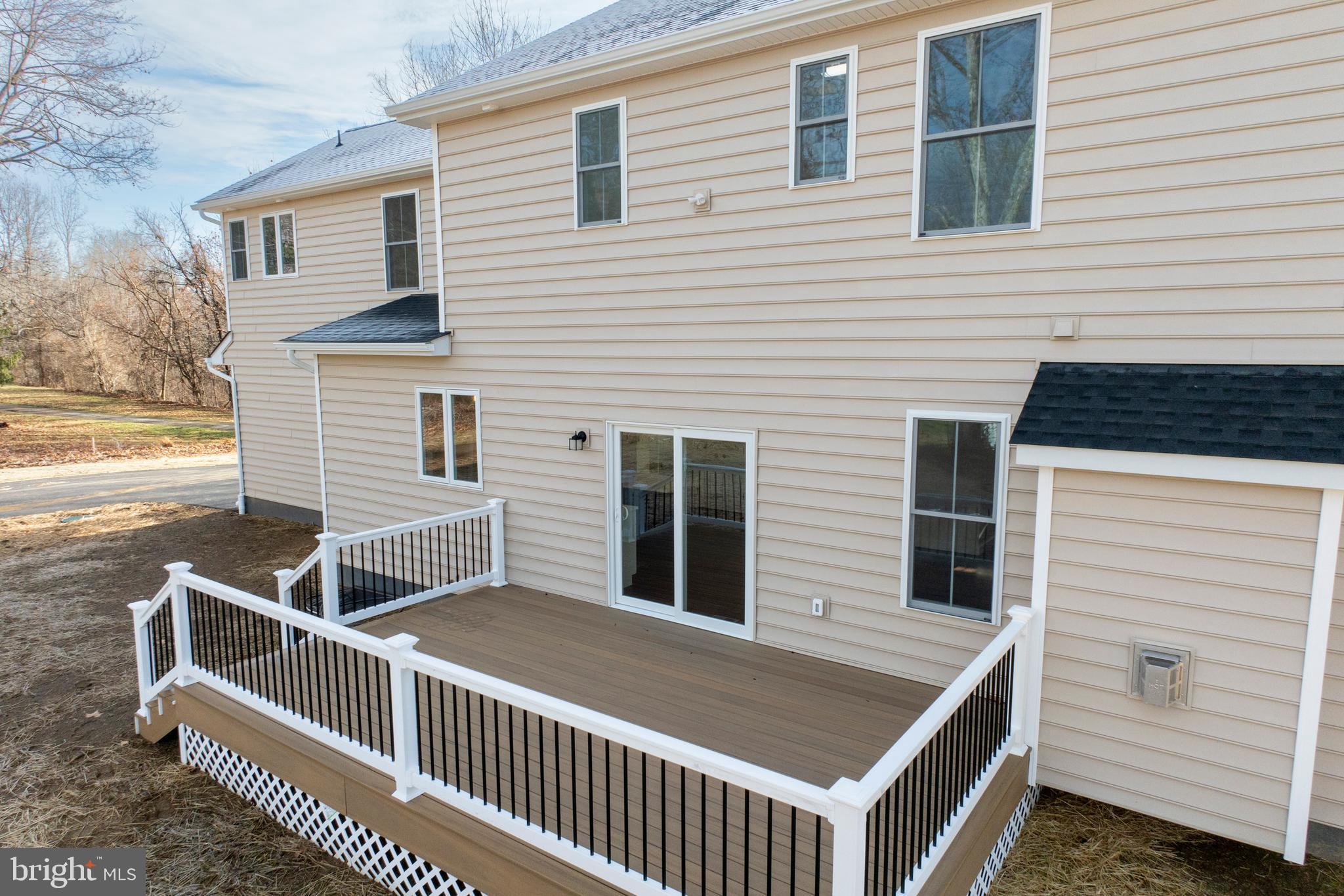 660 Little Conestoga Road Downingtown, PA 19335 - Photo 13 of 56 a view of a house with a balcony and wooden floor