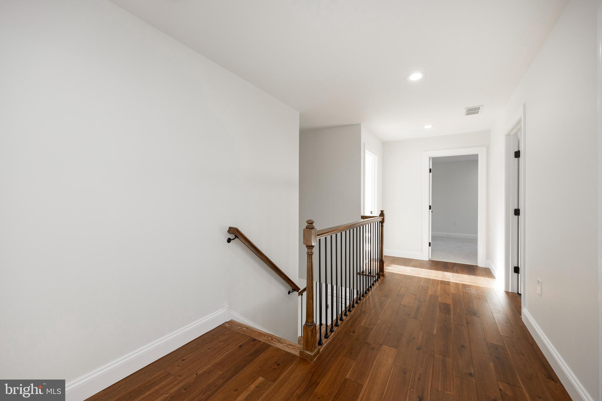 660 Little Conestoga Road Downingtown, PA 19335 - Photo 24 of 56 a view of a hallway with wooden floor