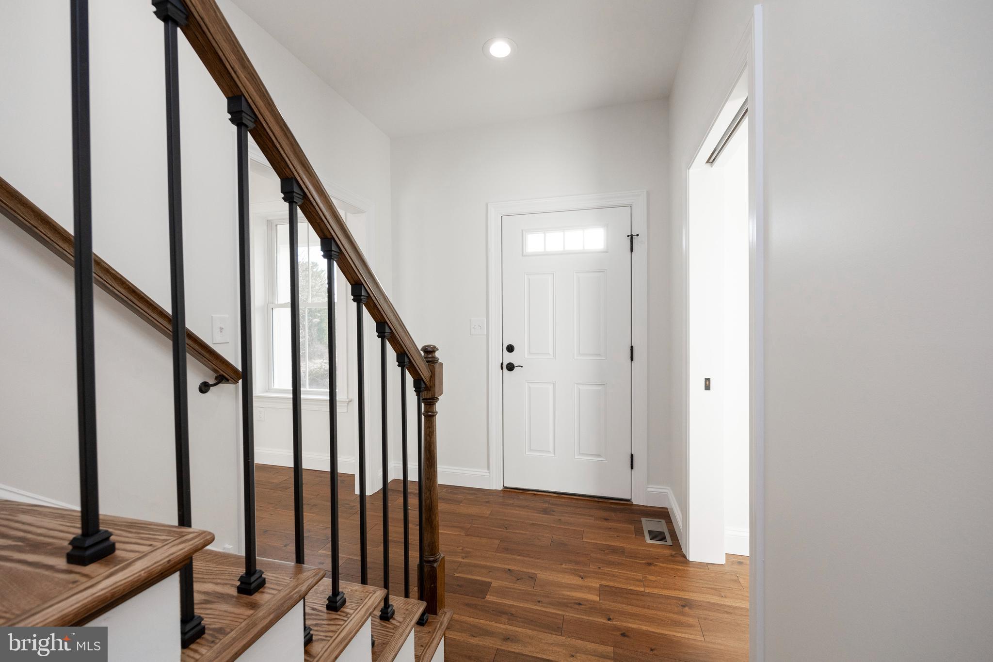 660 Little Conestoga Road Downingtown, PA 19335 - Photo 27 of 56 a view of an entryway with wooden floor and staircase