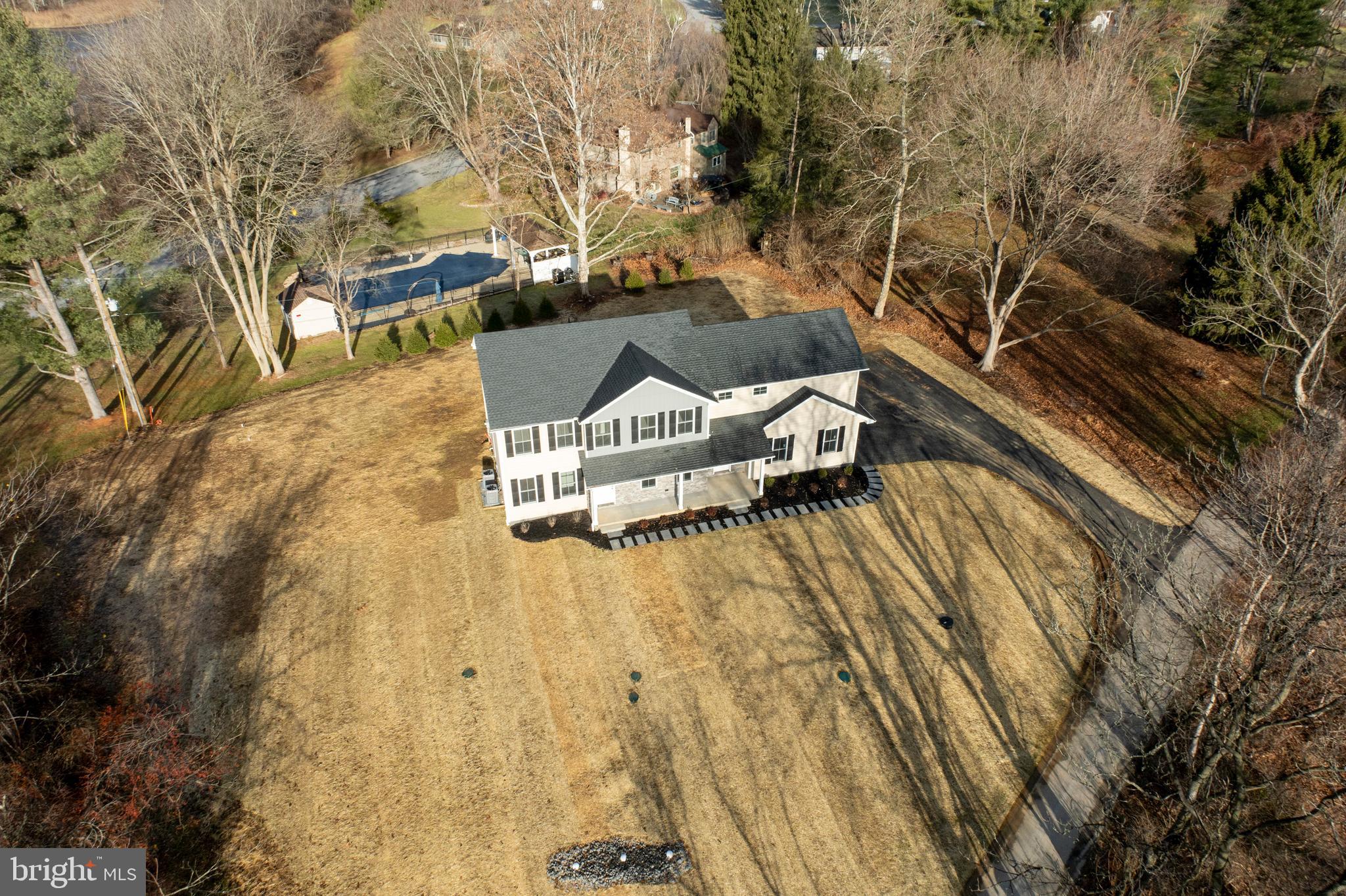 660 Little Conestoga Road Downingtown, PA 19335 - Photo 49 of 56 a view of a house with a yard
