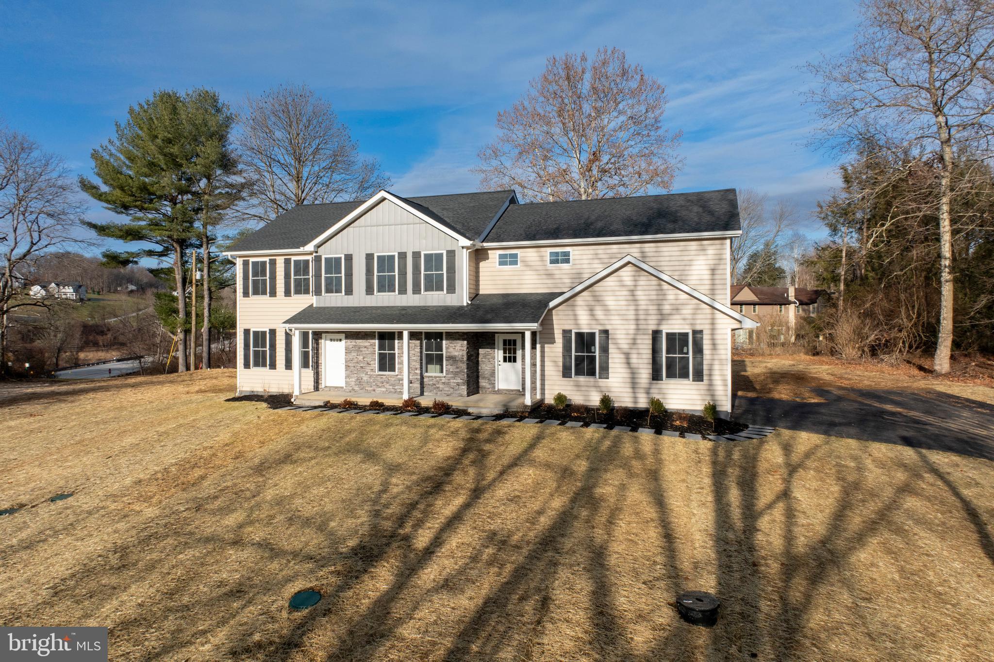660 Little Conestoga Road Downingtown, PA 19335 - Photo 52 of 56 a front view of a house with a yard