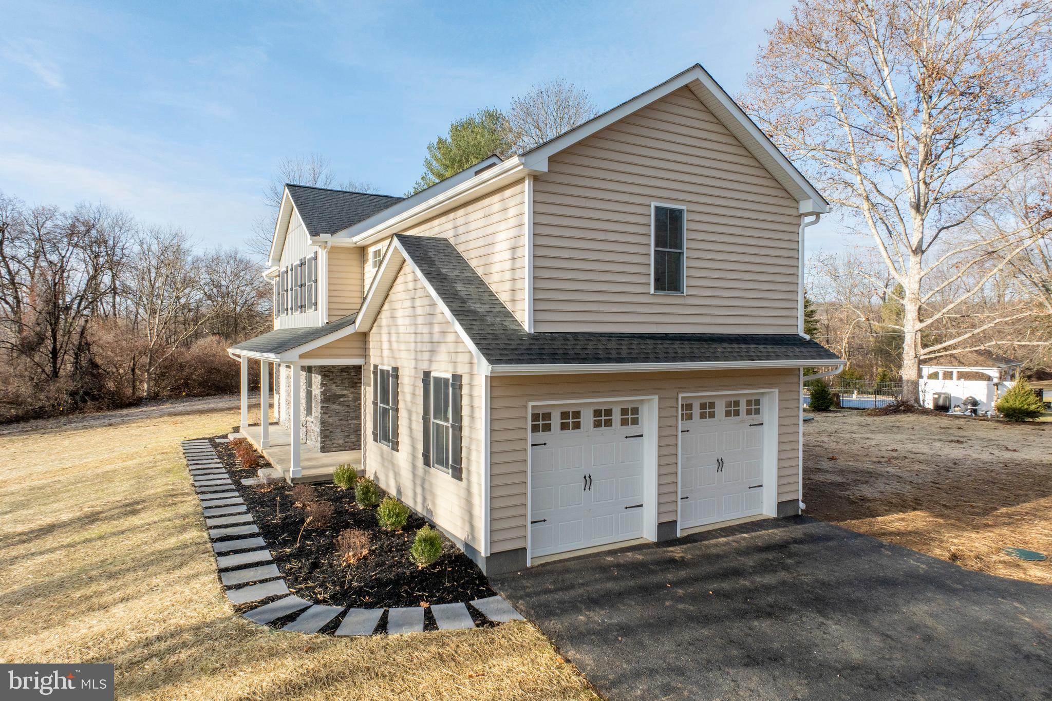 660 Little Conestoga Road Downingtown, PA 19335 - Photo 53 of 56 a view of a house with a yard