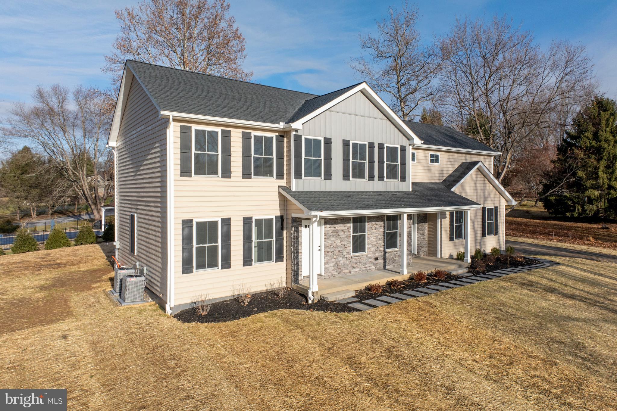 660 Little Conestoga Road Downingtown, PA 19335 - Photo 56 of 56 a front view of a house with a yard covered in snow