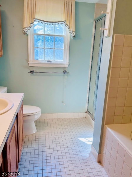 70 Boulder Run Road Paterson, NJ 07501 - Photo 6 of 29 a bathroom with a sink a toilet and a shower