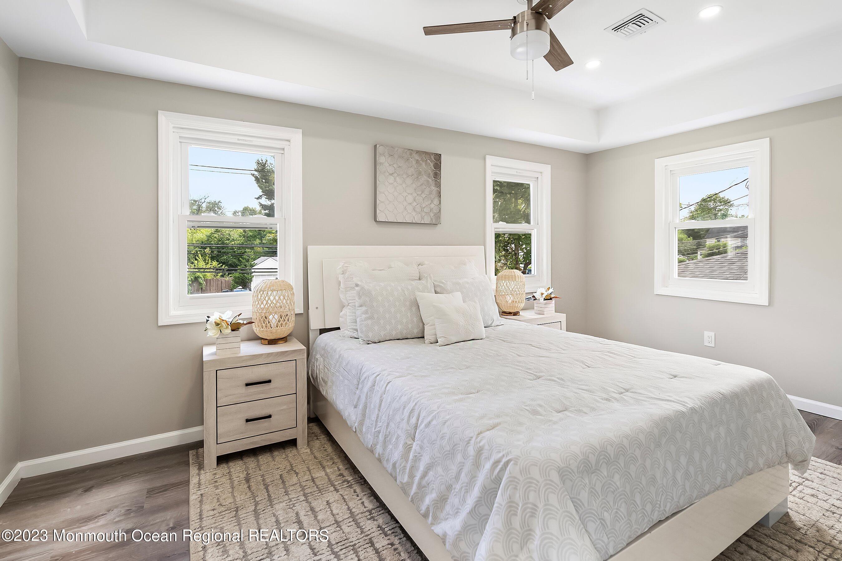 73 Main Street Englishtown, NJ 07726 - Photo 8 of 14 a bedroom with a bed and a window