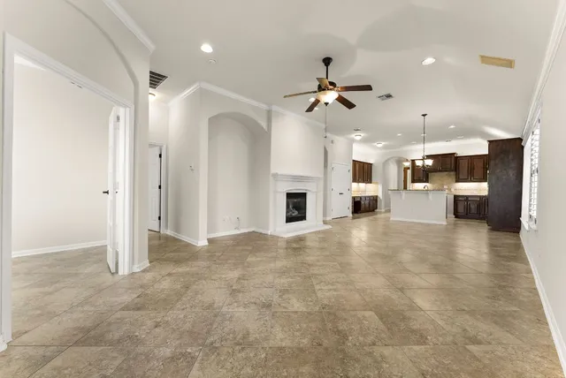 a view of a livingroom with a kitchen