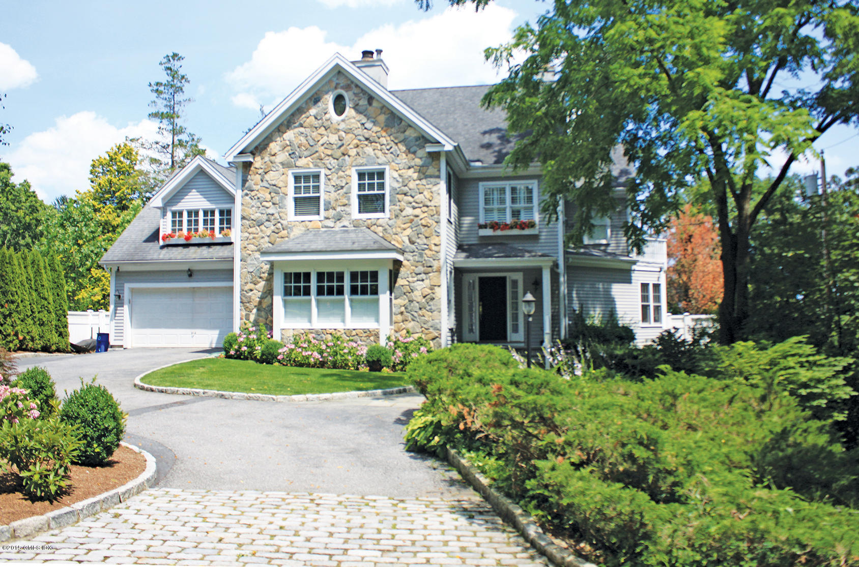 23 Willowmere Avenue Riverside, CT 06878 - Photo 1 of 21 front view of a house with a yard