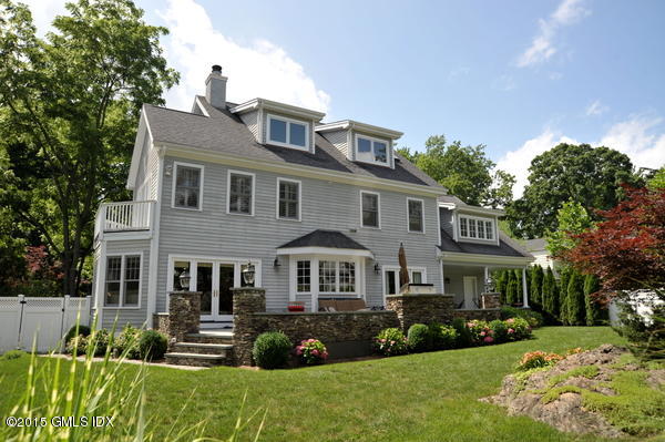 23 Willowmere Avenue Riverside, CT 06878 - Photo 17 of 21 a front view of a house with a yard