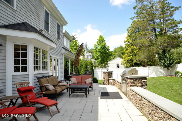 23 Willowmere Avenue Riverside, CT 06878 - Photo 18 of 21 a view of a patio with couches table and chairs and potted plants