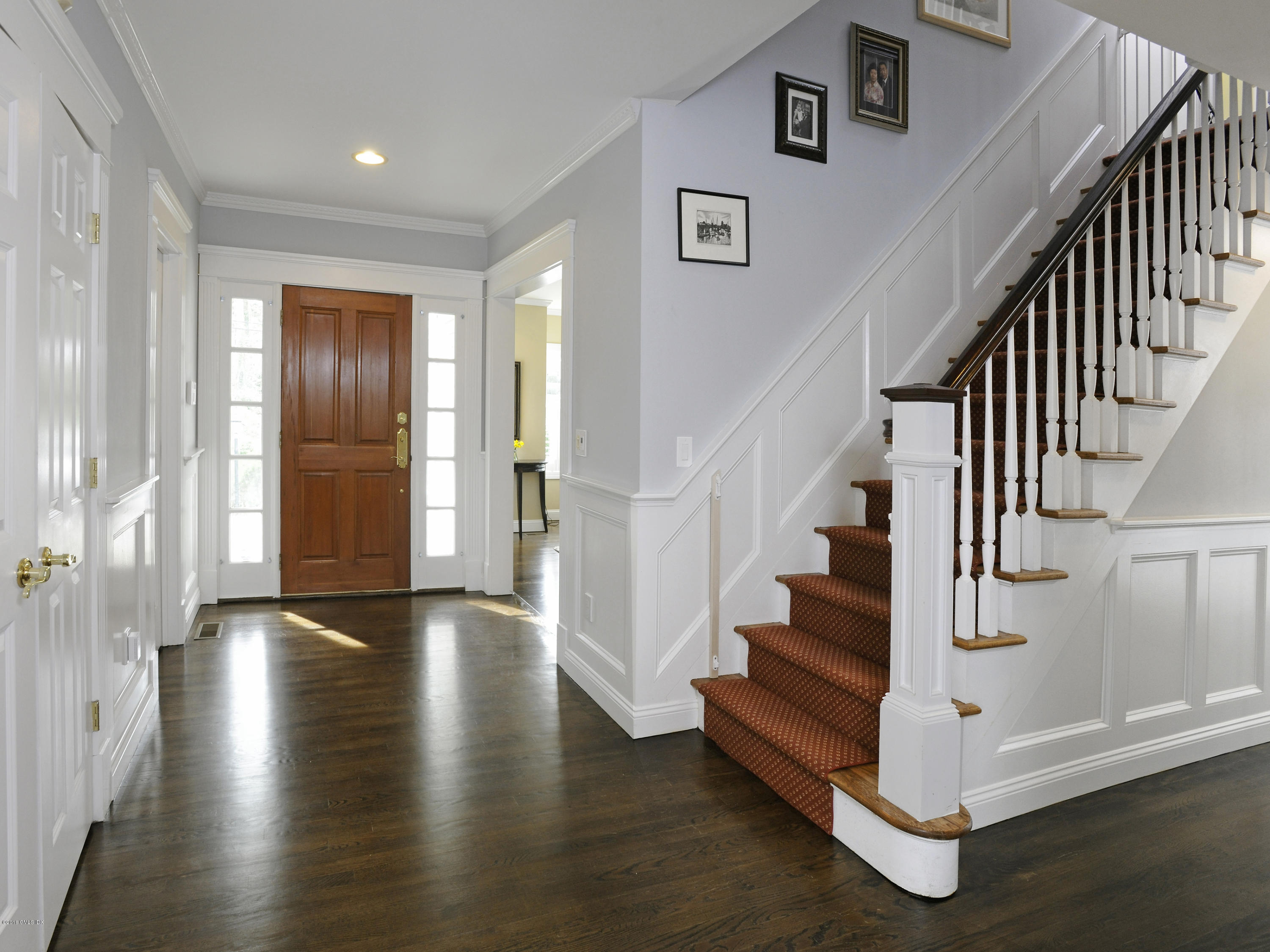 23 Willowmere Avenue Riverside, CT 06878 - Photo 7 of 21 a view of entryway and hall with wooden floor