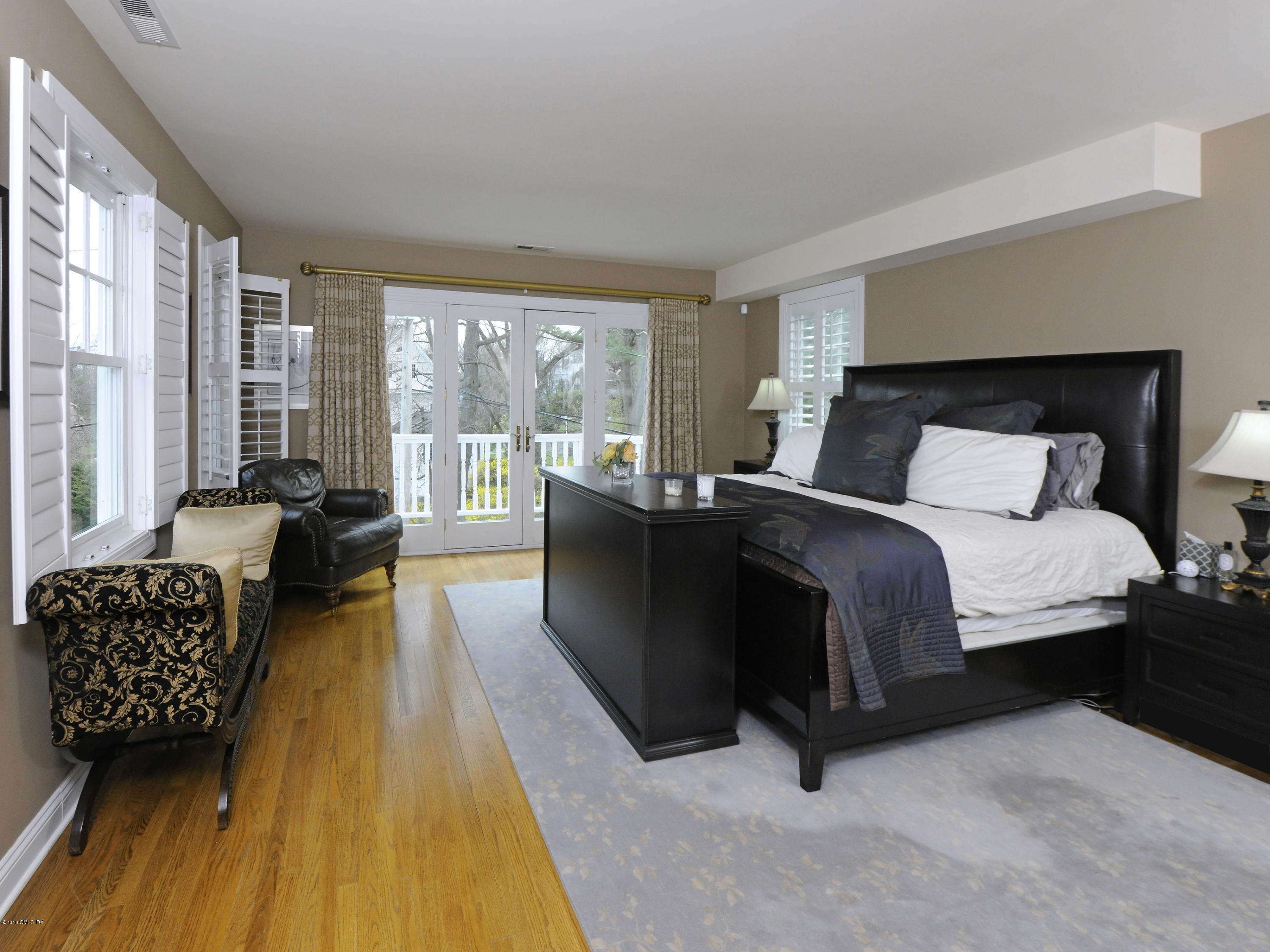 23 Willowmere Avenue Riverside, CT 06878 - Photo 8 of 21 a bedroom with a bed and a couch