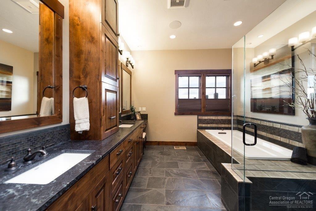 16163 South W Brasada Ranch Road Powell Butte, OR 97753 - Photo 10 of 24 a large bathroom with a large tub and sink