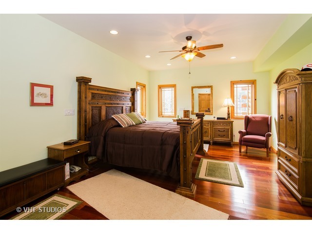11411 Armory Road Hebron, IL 60034 - Photo 13 of 22 a bedroom with furniture and wooden floor