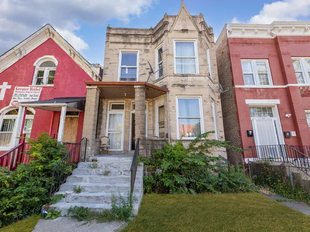 a front view of a multi story residential apartment building