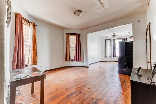 a view of an empty room with a window