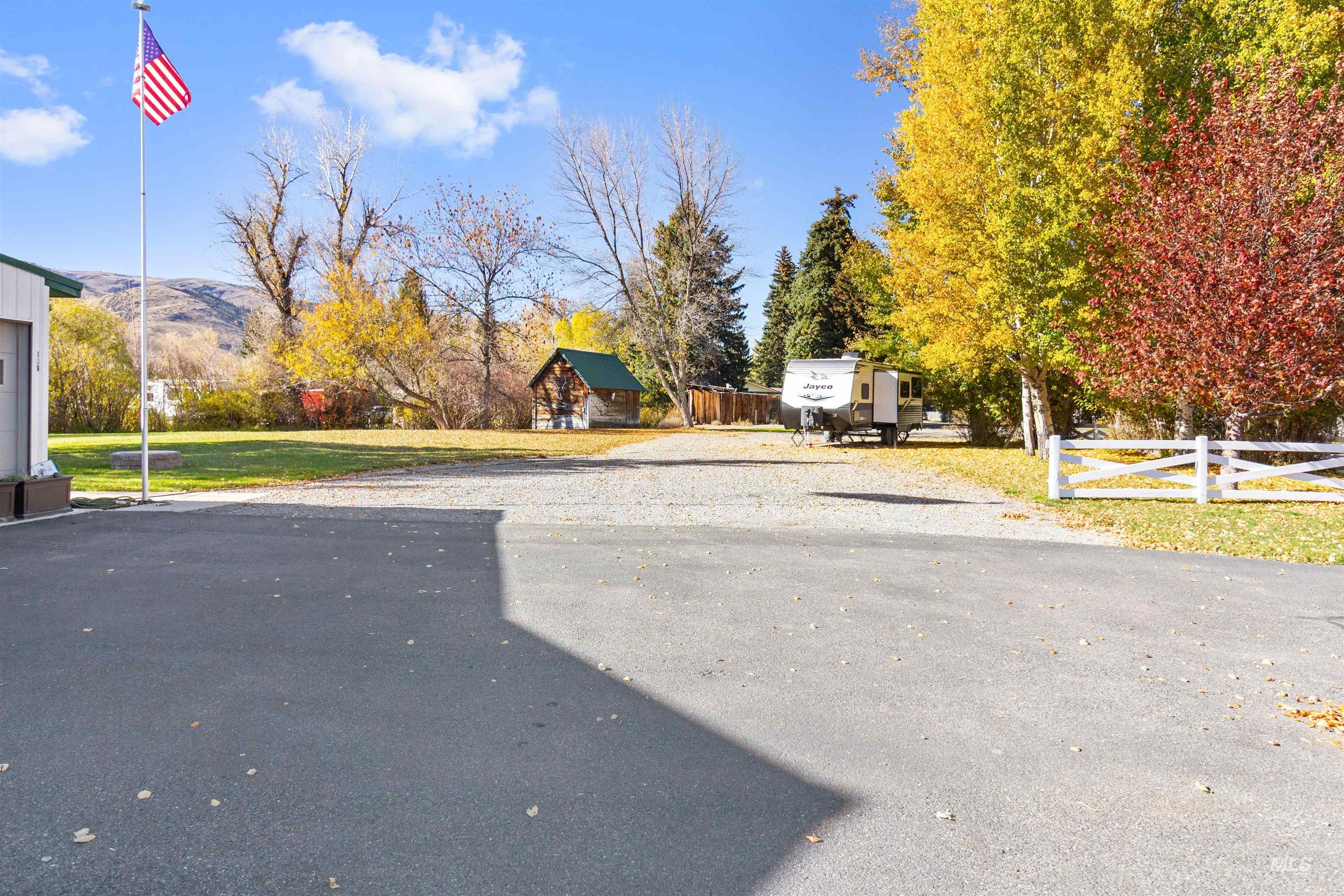 107 Willow Street Mackay, ID 83251 - Photo 41 of 48 View of asphalt driveway featuring a mountain view