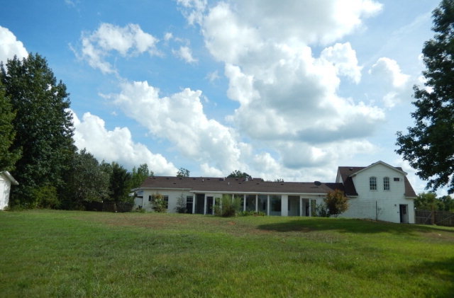 1030 Teagle Road Jackson, GA 30233 - Photo 4 of 7 a front view of a house with garden