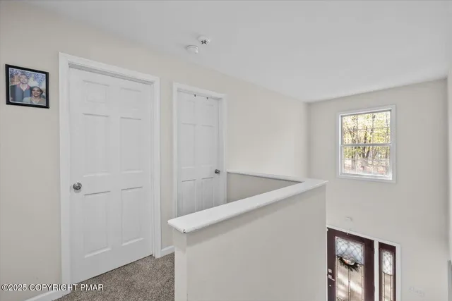 a view of an entryway with window