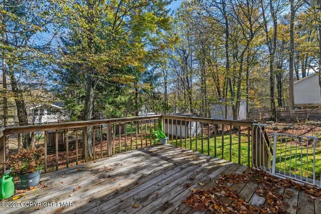 a view of a wooden house with a large window