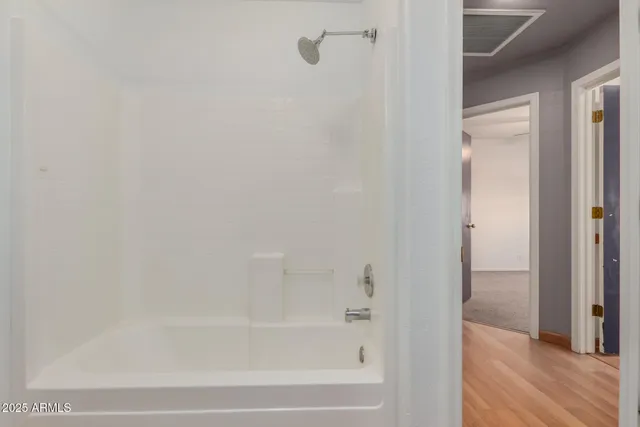 a close view of a bathtub in bathroom