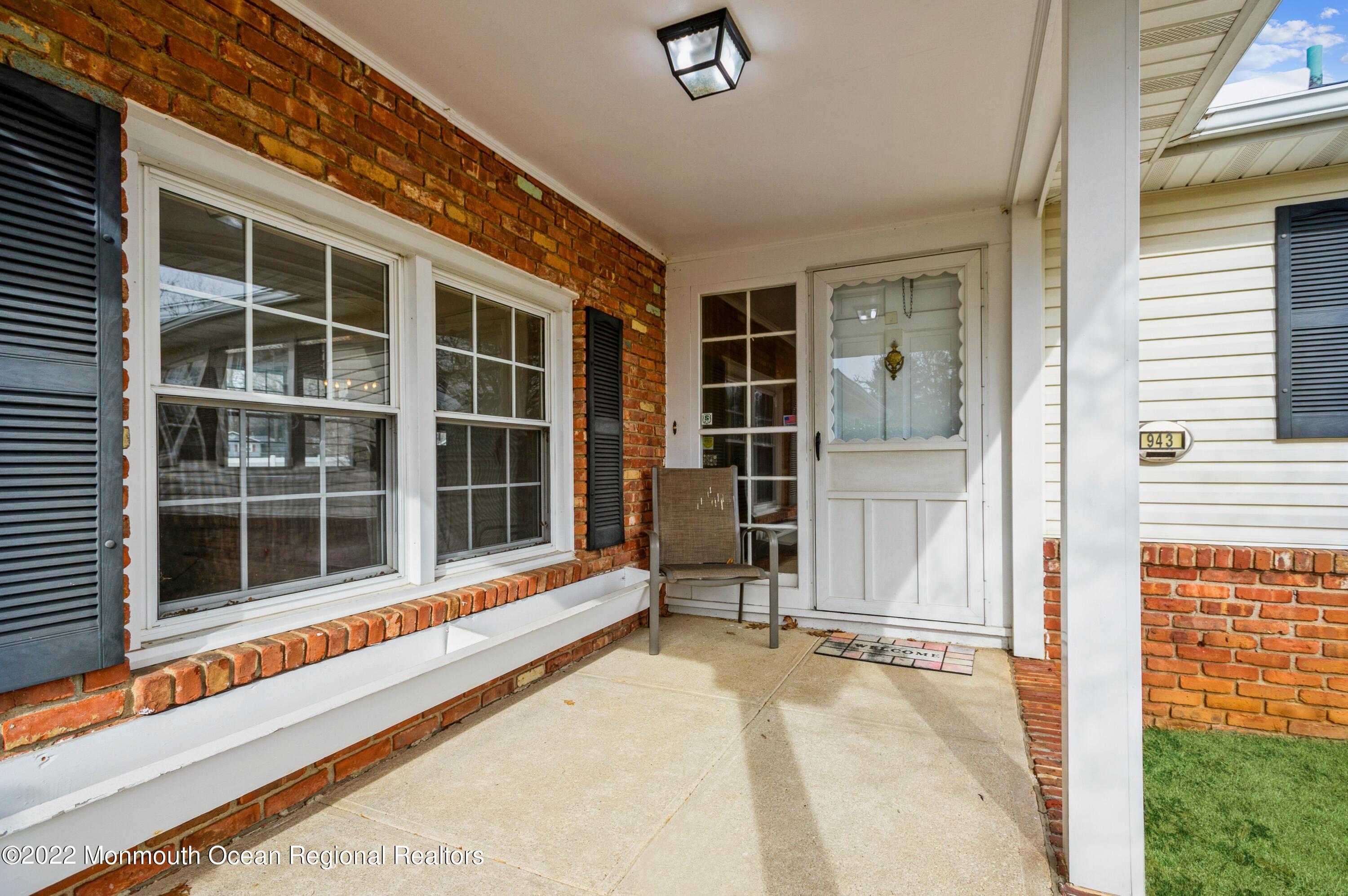 943 Middletown-Lincroft Road, Unit R Middletown, NJ 07748 - Photo 2 of 25 02_943MiddletownLincroftRd_57_FrontView_