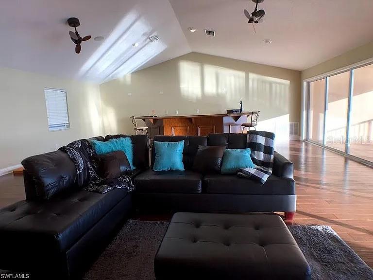 1647 Riverside Drive Daytona Beach, FL 32117 - Photo 15 of 29 a living room with furniture and a large window