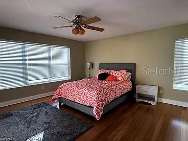 1647 Riverside Drive Daytona Beach, FL 32117 - Photo 16 of 29 a bedroom with a bed and a window
