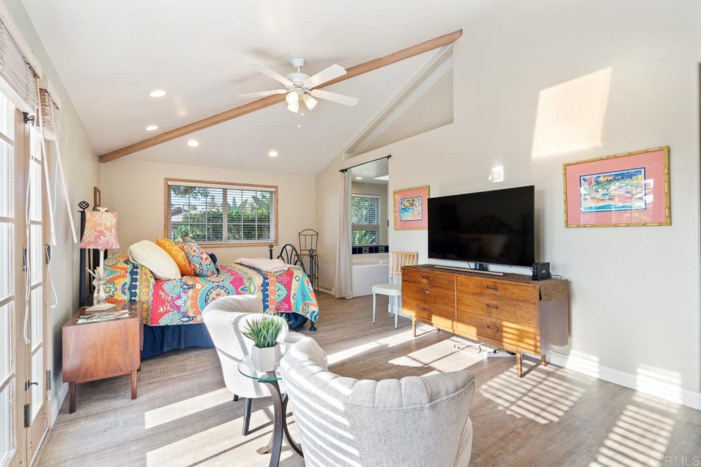 1754 Crest Drive Encinitas, CA 92024 - Photo 18 of 43 a living room with furniture and a flat screen tv