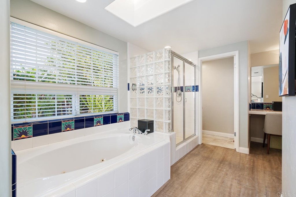 1754 Crest Drive Encinitas, CA 92024 - Photo 20 of 43 a bathroom with a bathtub and a sink