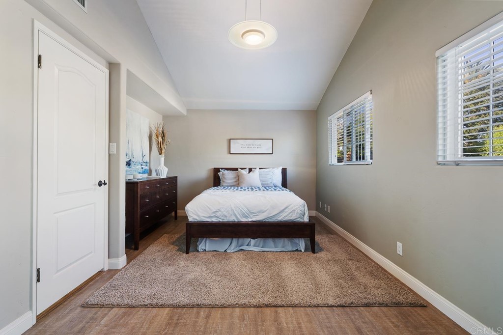 1754 Crest Drive Encinitas, CA 92024 - Photo 21 of 43 a bedroom with a bed and window