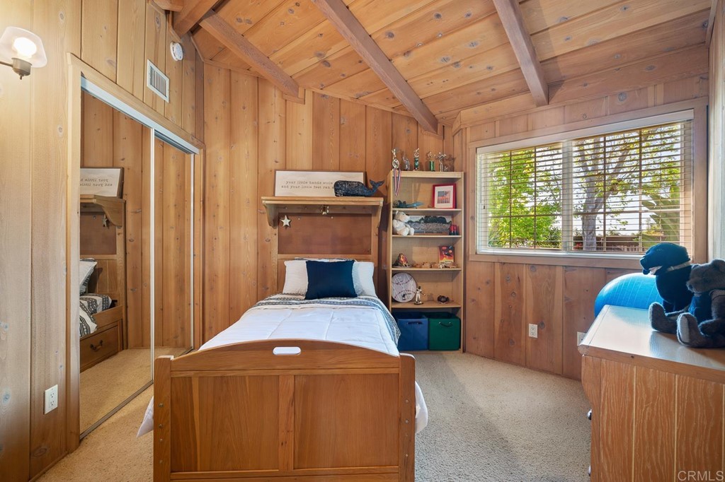 1754 Crest Drive Encinitas, CA 92024 - Photo 23 of 43 a bedroom with furniture and a window