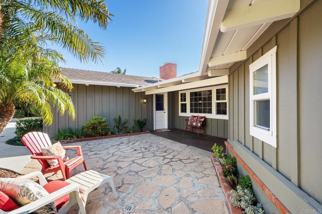 1754 Crest Drive Encinitas, CA 92024 - Photo 4 of 43 a view of a house with a chairs in patio