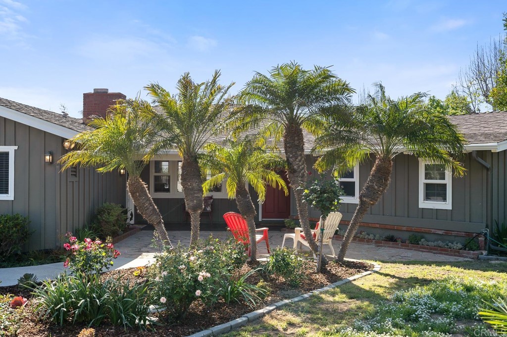 1754 Crest Drive Encinitas, CA 92024 - Photo 5 of 43 a front view of a house with a yard