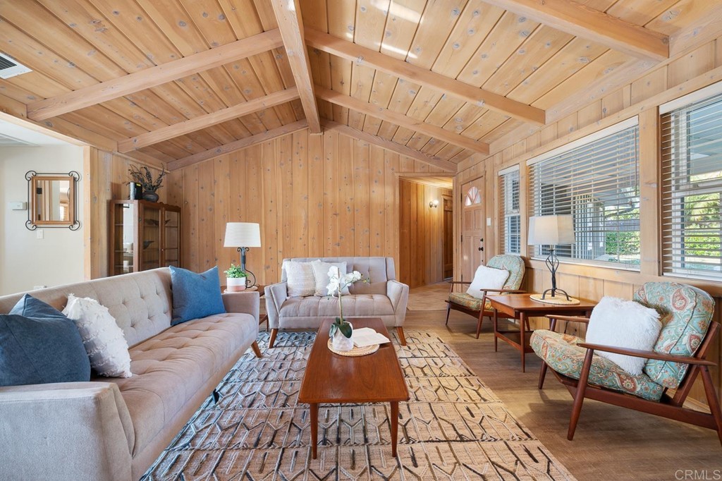 1754 Crest Drive Encinitas, CA 92024 - Photo 9 of 43 a living room with furniture and a large window