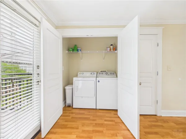 a view of a storage & utility room with a sink