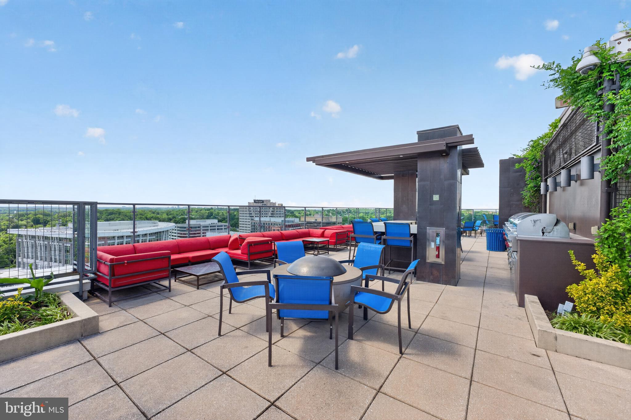 851 North Glebe Road, Unit 1301 Arlington, VA 22203 - Photo 47 of 84 Rooftop Patio with Fire Pit, Friends, & Fresh Air!