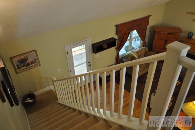 751 Pine Hill Road Boone, NC 28607 - Photo 14 of 27 a view of a balcony with wooden floor