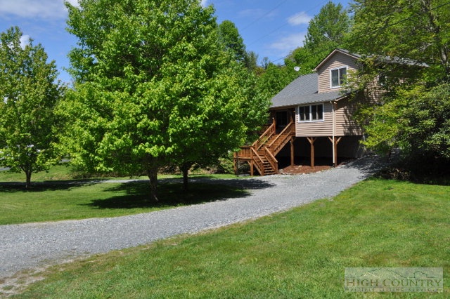 751 Pine Hill Road Boone, NC 28607 - Photo 2 of 27 a front view of a house with a yard